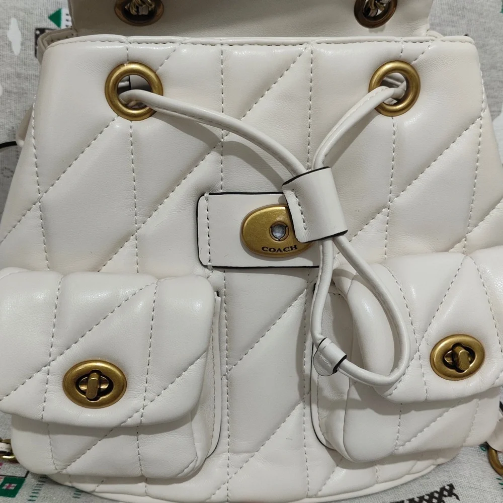 Coach Quilted Chalk Leather Drawstring Backpack with Gold Hardware